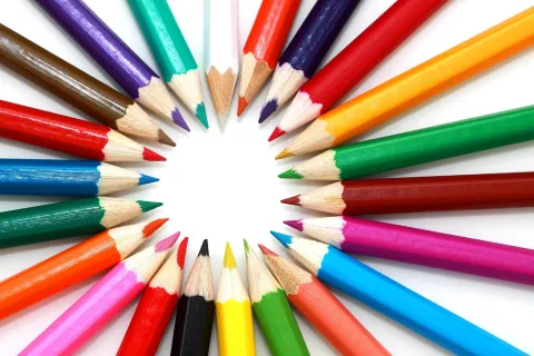 A ring made out of colored pencils. 