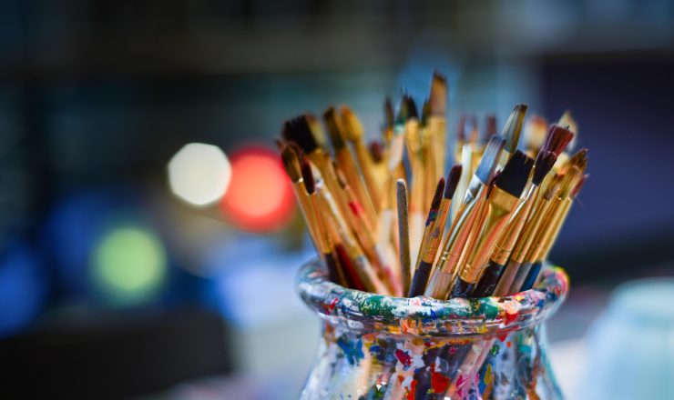 Jar with paint brushes