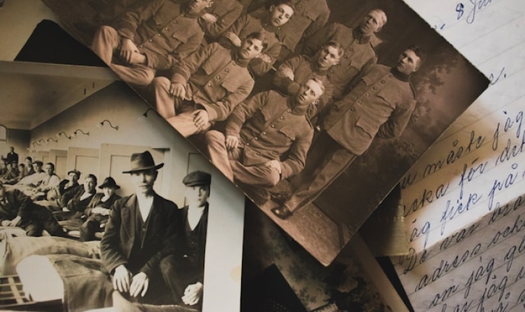 Box of old photographs and papers